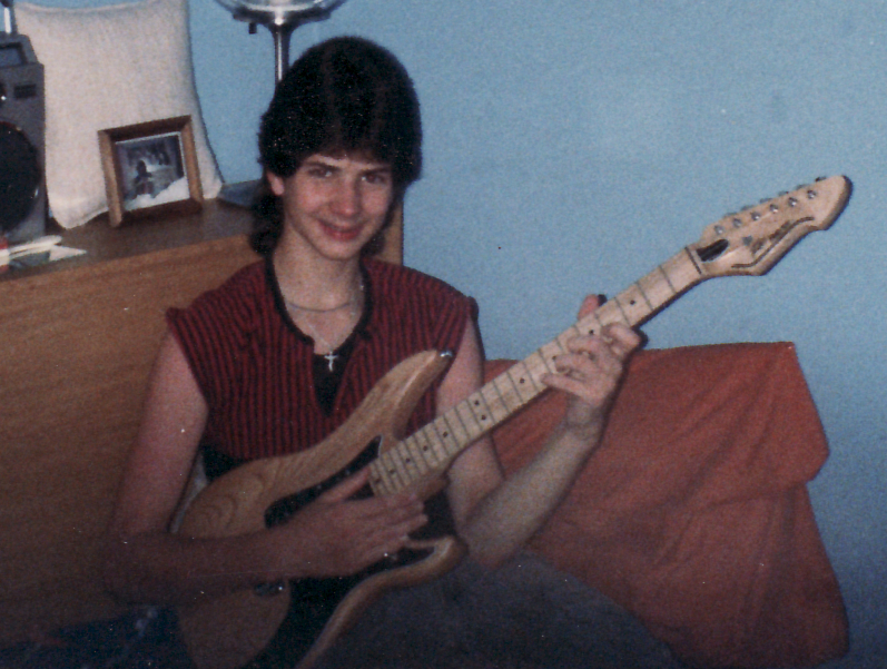Todd with first electric guitar - a Peavey Patriot circa 1985